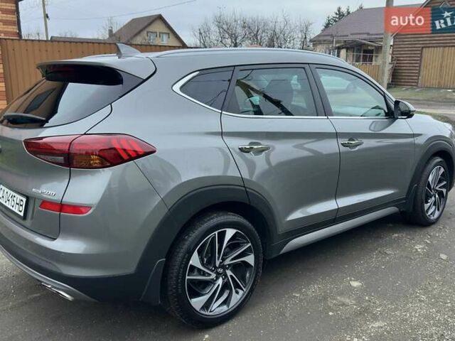 Сірий Хендай Туксон, об'ємом двигуна 2 л та пробігом 103 тис. км за 24700 $, фото 4 на Automoto.ua