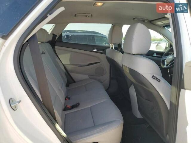 Серый Хендай Туксон, объемом двигателя 2 л и пробегом 94 тыс. км за 3000 $, фото 10 на Automoto.ua