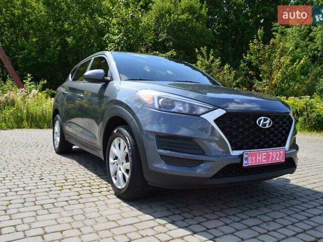 Серый Хендай Туксон, объемом двигателя 2 л и пробегом 168 тыс. км за 16500 $, фото 2 на Automoto.ua