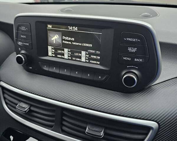 Сірий Хендай Туксон, об'ємом двигуна 2 л та пробігом 136 тис. км за 17300 $, фото 4 на Automoto.ua