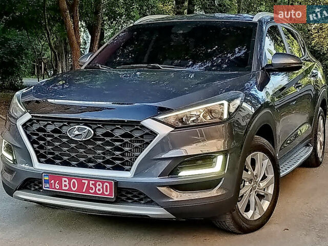 Серый Хендай Туксон, объемом двигателя 2 л и пробегом 97 тыс. км за 21888 $, фото 2 на Automoto.ua