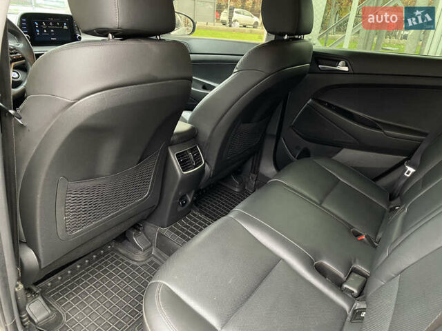 Серый Хендай Туксон, объемом двигателя 2 л и пробегом 73 тыс. км за 22400 $, фото 16 на Automoto.ua