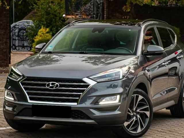 Серый Хендай Туксон, объемом двигателя 1.6 л и пробегом 100 тыс. км за 9900 $, фото 3 на Automoto.ua