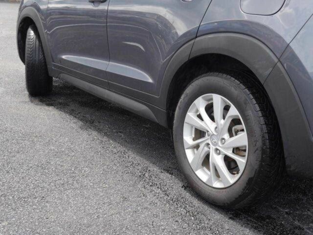 Серый Хендай Туксон, объемом двигателя 2 л и пробегом 149 тыс. км за 15000 $, фото 8 на Automoto.ua