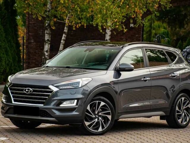 Серый Хендай Туксон, объемом двигателя 1.6 л и пробегом 100 тыс. км за 9900 $, фото 1 на Automoto.ua