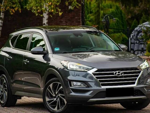 Серый Хендай Туксон, объемом двигателя 1.6 л и пробегом 100 тыс. км за 9900 $, фото 4 на Automoto.ua