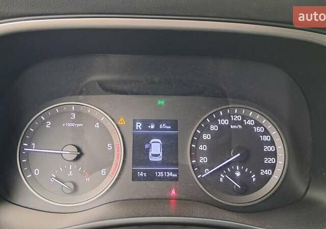 Серый Хендай Туксон, объемом двигателя 2 л и пробегом 135 тыс. км за 24500 $, фото 5 на Automoto.ua