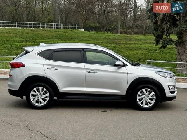 Серый Хендай Туксон, объемом двигателя 2 л и пробегом 32 тыс. км за 22800 $, фото 17 на Automoto.ua