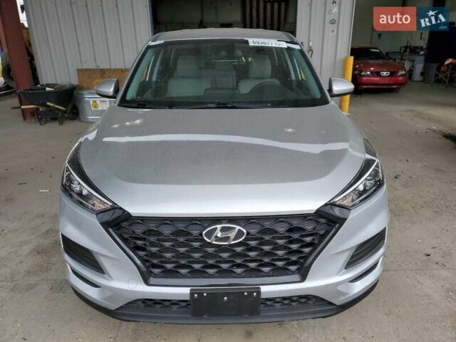 Серый Хендай Туксон, объемом двигателя 2 л и пробегом 104 тыс. км за 5600 $, фото 4 на Automoto.ua