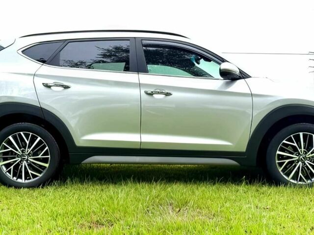 Серый Хендай Туксон, объемом двигателя 2.4 л и пробегом 39 тыс. км за 9500 $, фото 7 на Automoto.ua