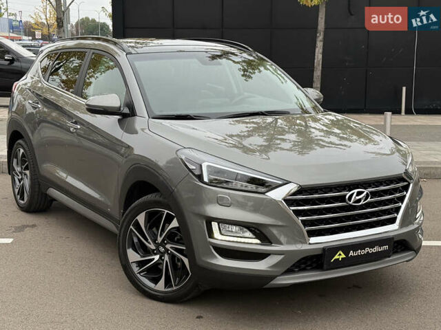 Серый Хендай Туксон, объемом двигателя 2 л и пробегом 28 тыс. км за 32800 $, фото 4 на Automoto.ua