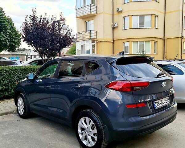 Серый Хендай Туксон, объемом двигателя 2 л и пробегом 87 тыс. км за 18600 $, фото 7 на Automoto.ua