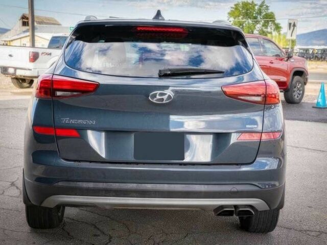 Серый Хендай Туксон, объемом двигателя 2.4 л и пробегом 33 тыс. км за 14000 $, фото 6 на Automoto.ua