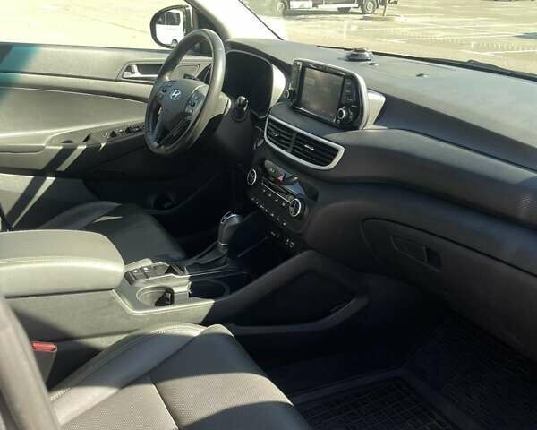 Сірий Хендай Туксон, об'ємом двигуна 2 л та пробігом 81 тис. км за 22000 $, фото 14 на Automoto.ua