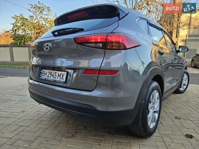 Серый Хендай Туксон, объемом двигателя 2 л и пробегом 21 тыс. км за 22500 $, фото 8 на Automoto.ua