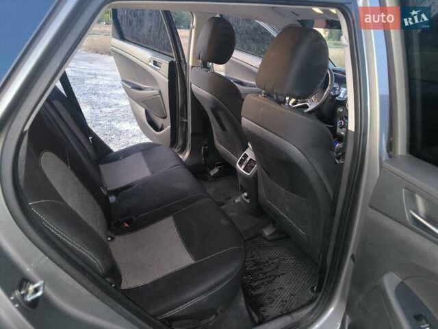 Серый Хендай Туксон, объемом двигателя 2 л и пробегом 92 тыс. км за 23500 $, фото 18 на Automoto.ua