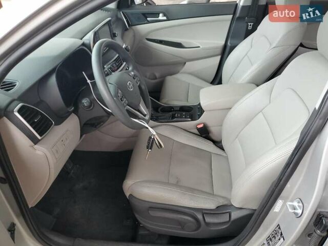 Серый Хендай Туксон, объемом двигателя 2 л и пробегом 104 тыс. км за 5600 $, фото 6 на Automoto.ua