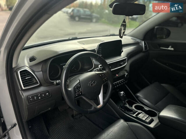 Сірий Хендай Туксон, об'ємом двигуна 2 л та пробігом 176 тис. км за 22999 $, фото 24 на Automoto.ua