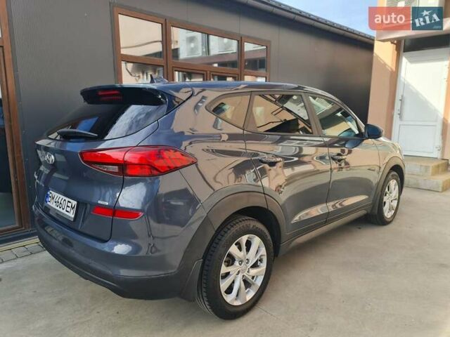 Серый Хендай Туксон, объемом двигателя 2 л и пробегом 87 тыс. км за 18600 $, фото 5 на Automoto.ua