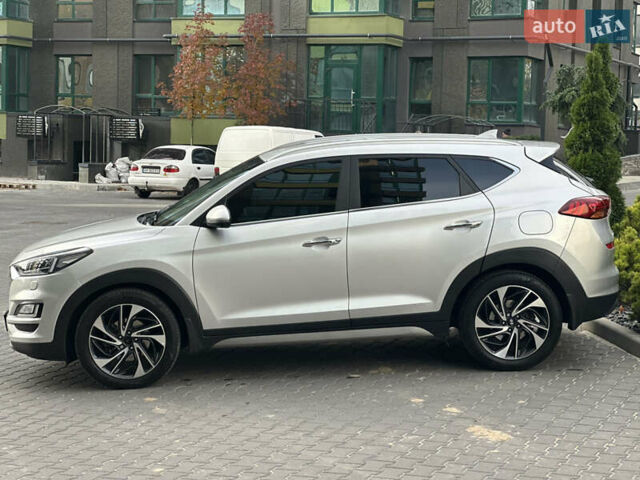 Сірий Хендай Туксон, об'ємом двигуна 2 л та пробігом 176 тис. км за 22999 $, фото 9 на Automoto.ua