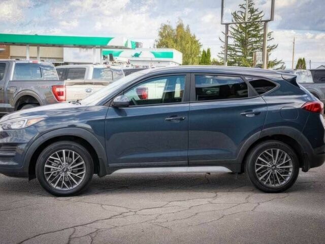 Серый Хендай Туксон, объемом двигателя 2.4 л и пробегом 33 тыс. км за 14000 $, фото 4 на Automoto.ua