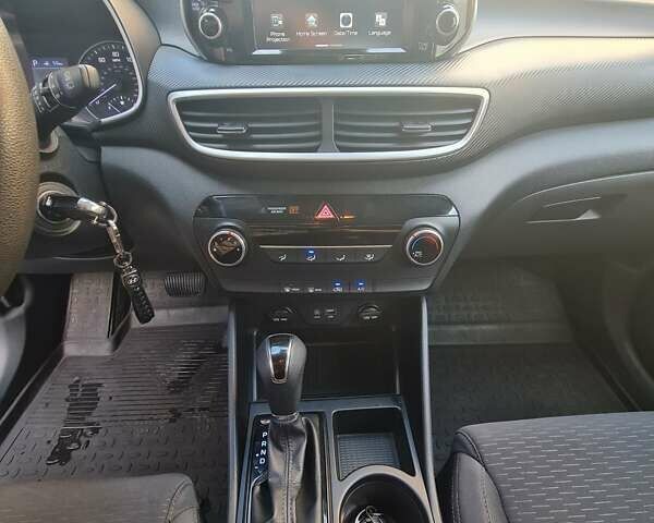 Серый Хендай Туксон, объемом двигателя 2 л и пробегом 87 тыс. км за 18600 $, фото 14 на Automoto.ua