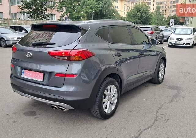 Серый Хендай Туксон, объемом двигателя 2 л и пробегом 135 тыс. км за 24500 $, фото 8 на Automoto.ua
