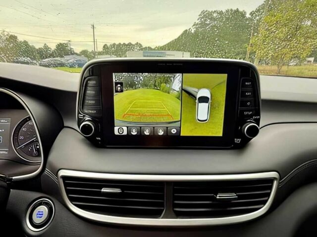 Серый Хендай Туксон, объемом двигателя 2.4 л и пробегом 39 тыс. км за 9500 $, фото 8 на Automoto.ua