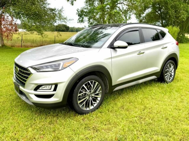 Серый Хендай Туксон, объемом двигателя 2.4 л и пробегом 39 тыс. км за 9500 $, фото 2 на Automoto.ua