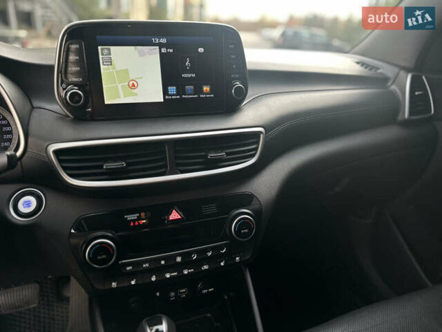 Сірий Хендай Туксон, об'ємом двигуна 2 л та пробігом 176 тис. км за 22999 $, фото 32 на Automoto.ua