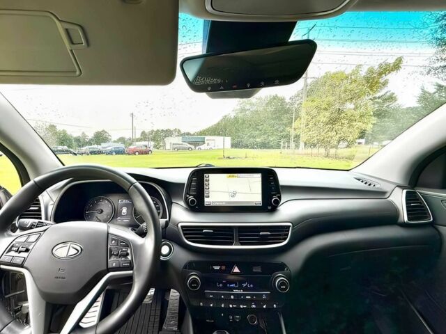 Серый Хендай Туксон, объемом двигателя 2.4 л и пробегом 39 тыс. км за 9500 $, фото 9 на Automoto.ua