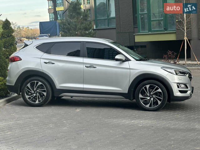 Сірий Хендай Туксон, об'ємом двигуна 2 л та пробігом 176 тис. км за 22999 $, фото 4 на Automoto.ua