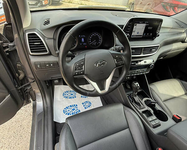 Серый Хендай Туксон, объемом двигателя 1.6 л и пробегом 124 тыс. км за 23499 $, фото 22 на Automoto.ua