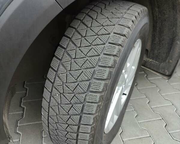 Серый Хендай Туксон, объемом двигателя 2 л и пробегом 60 тыс. км за 19500 $, фото 12 на Automoto.ua