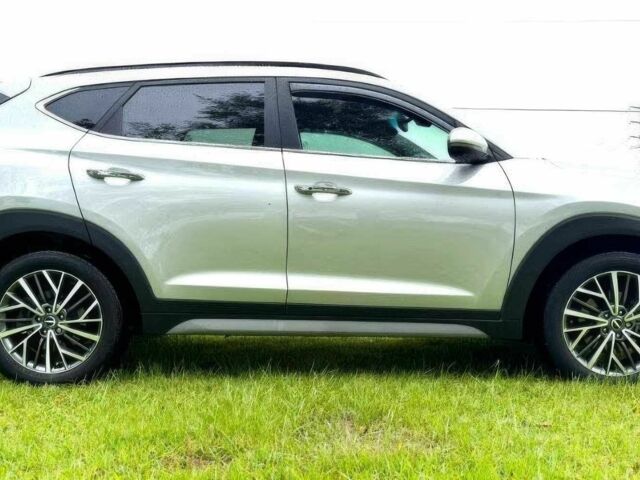 Сірий Хендай Туксон, об'ємом двигуна 2.4 л та пробігом 39 тис. км за 9000 $, фото 7 на Automoto.ua