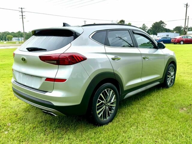 Серый Хендай Туксон, объемом двигателя 2.4 л и пробегом 39 тыс. км за 9500 $, фото 6 на Automoto.ua