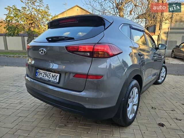 Серый Хендай Туксон, объемом двигателя 2 л и пробегом 21 тыс. км за 22500 $, фото 7 на Automoto.ua