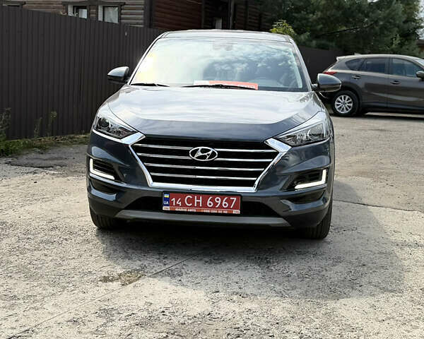 Серый Хендай Туксон, объемом двигателя 1.6 л и пробегом 124 тыс. км за 23499 $, фото 5 на Automoto.ua