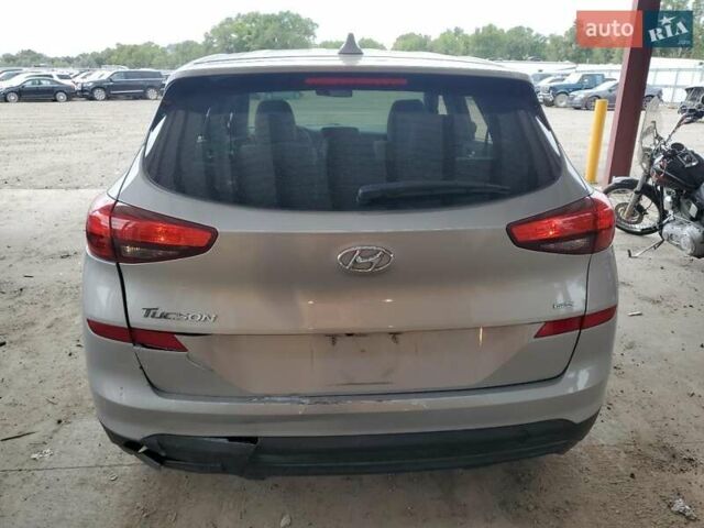 Серый Хендай Туксон, объемом двигателя 2 л и пробегом 104 тыс. км за 5600 $, фото 5 на Automoto.ua