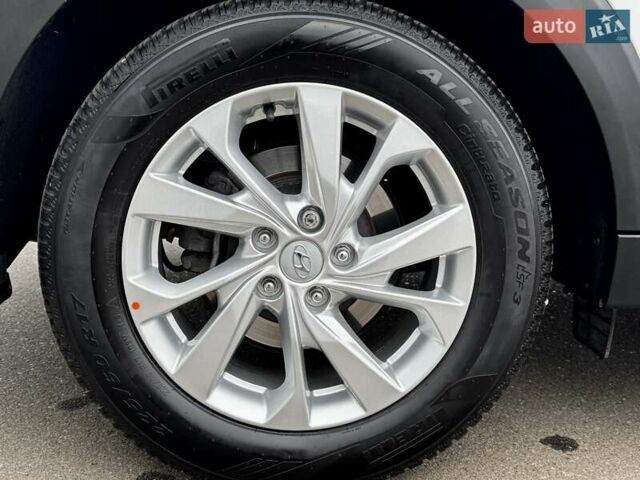 Серый Хендай Туксон, объемом двигателя 2 л и пробегом 32 тыс. км за 22800 $, фото 28 на Automoto.ua