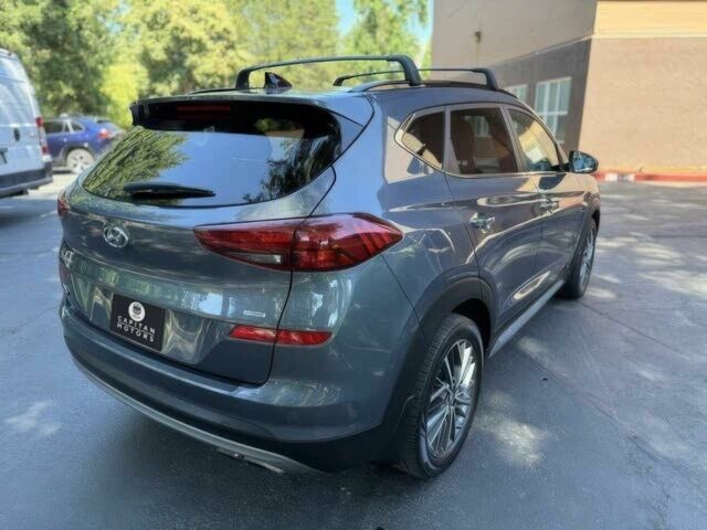 Серый Хендай Туксон, объемом двигателя 2.4 л и пробегом 23 тыс. км за 5400 $, фото 6 на Automoto.ua