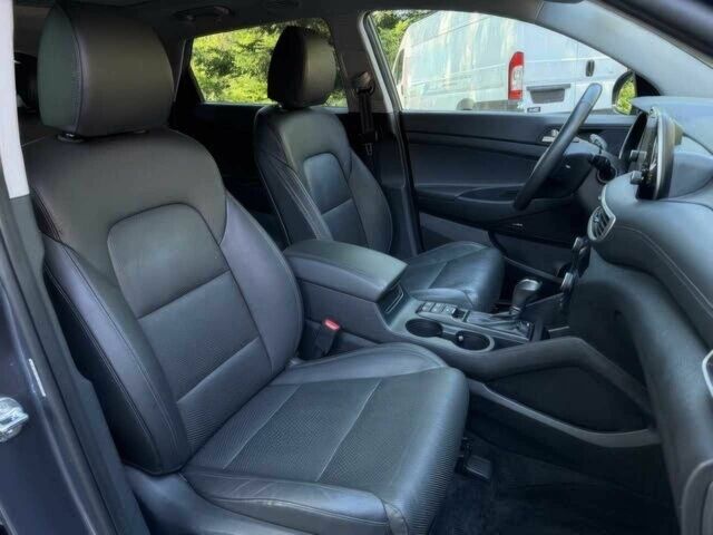 Серый Хендай Туксон, объемом двигателя 2.4 л и пробегом 23 тыс. км за 5400 $, фото 8 на Automoto.ua