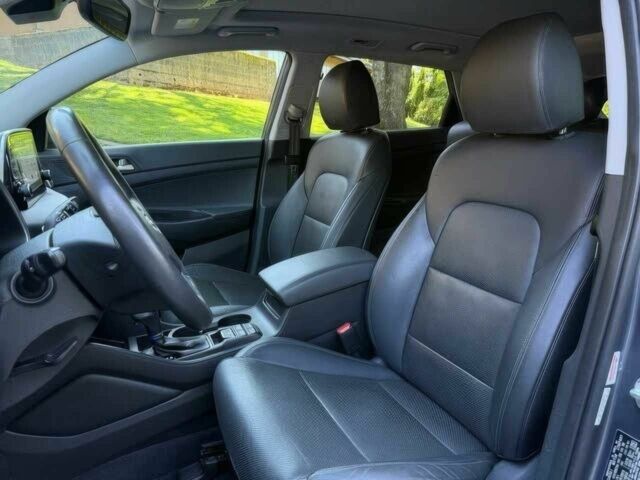 Серый Хендай Туксон, объемом двигателя 2.4 л и пробегом 23 тыс. км за 5400 $, фото 9 на Automoto.ua