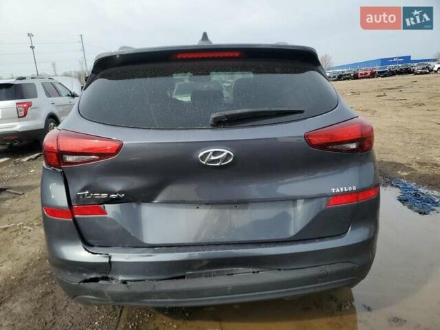 Серый Хендай Туксон, объемом двигателя 2 л и пробегом 56 тыс. км за 3000 $, фото 5 на Automoto.ua