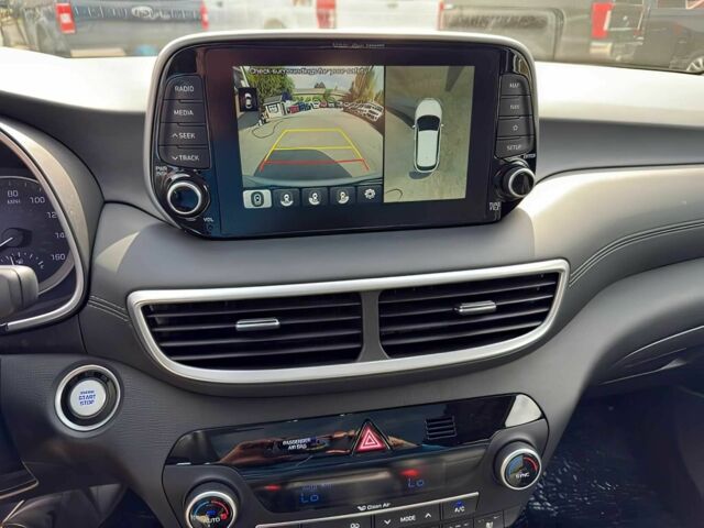 Серый Хендай Туксон, объемом двигателя 2.4 л и пробегом 18 тыс. км за 16000 $, фото 10 на Automoto.ua