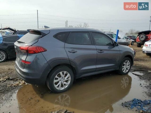 Серый Хендай Туксон, объемом двигателя 2 л и пробегом 56 тыс. км за 3000 $, фото 2 на Automoto.ua