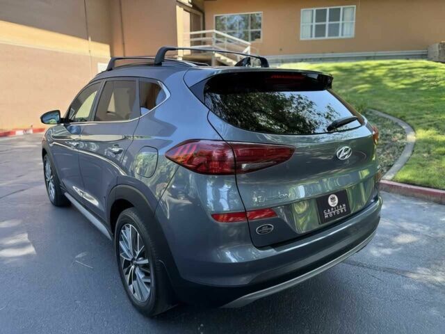Серый Хендай Туксон, объемом двигателя 2.4 л и пробегом 23 тыс. км за 5400 $, фото 4 на Automoto.ua