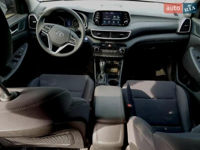 Серый Хендай Туксон, объемом двигателя 2 л и пробегом 56 тыс. км за 3000 $, фото 7 на Automoto.ua