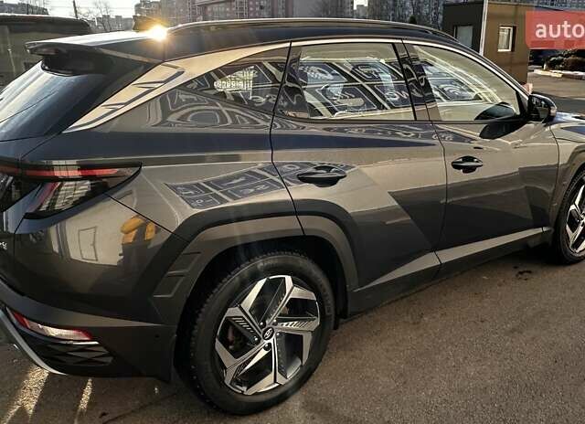 Серый Хендай Туксон, объемом двигателя 1.6 л и пробегом 65 тыс. км за 33500 $, фото 4 на Automoto.ua