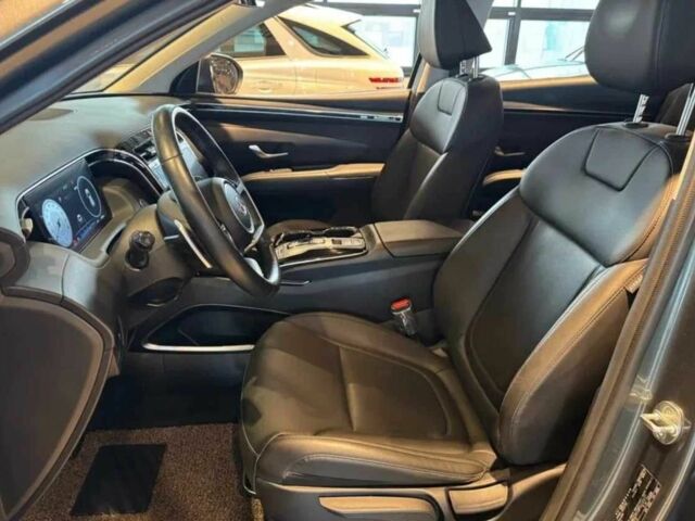 Серый Хендай Туксон, объемом двигателя 2 л и пробегом 55 тыс. км за 16800 $, фото 5 на Automoto.ua